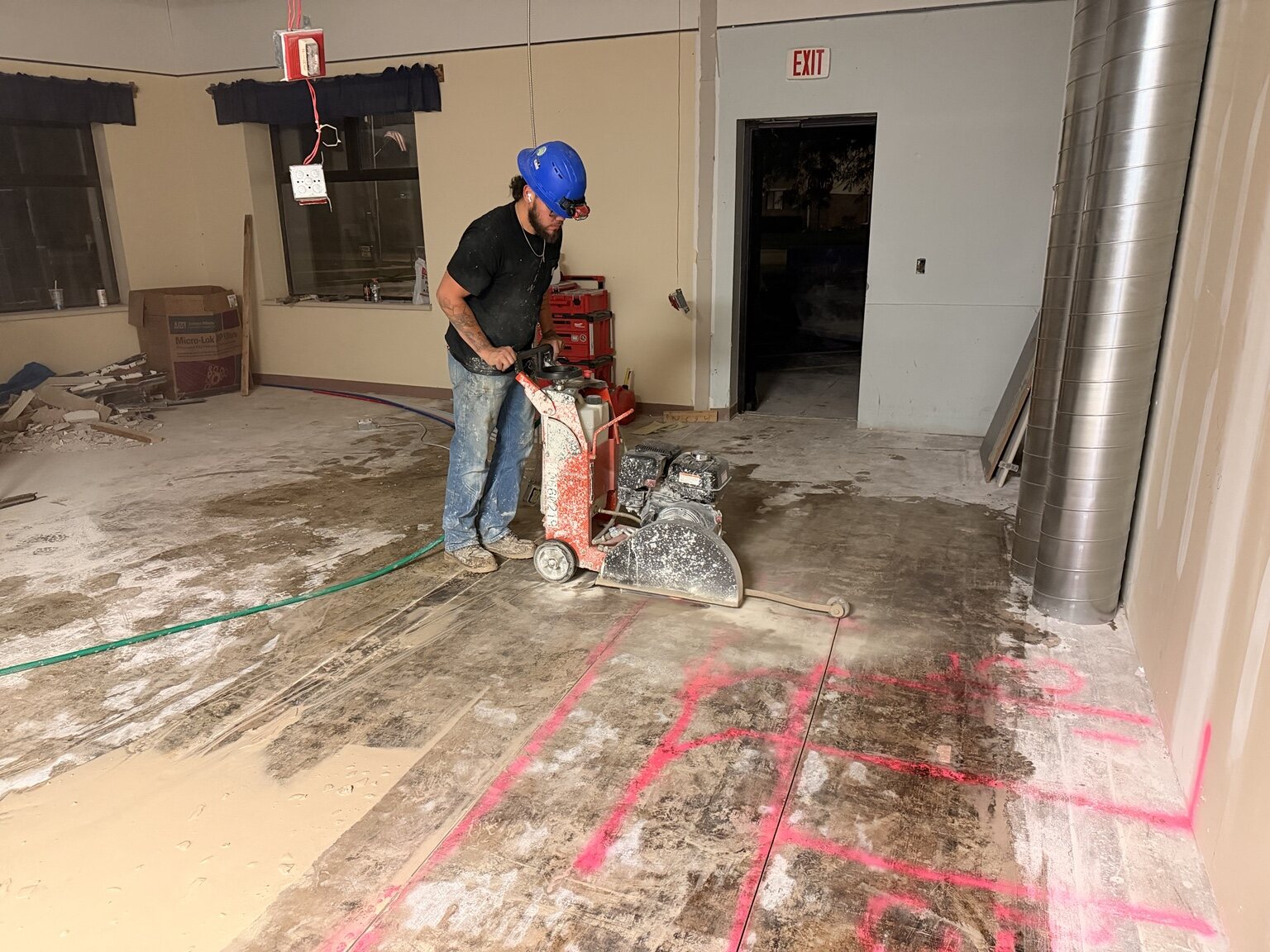S&S Demolition operator saw cutting a commercial concrete floor